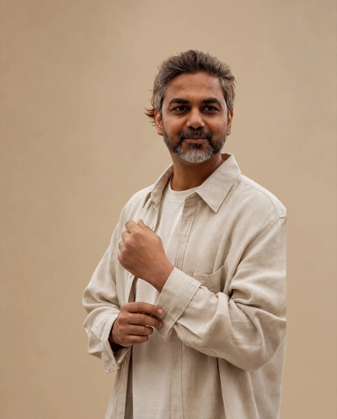 Aabhishek Siloya in a warm, close-up studio portrait.